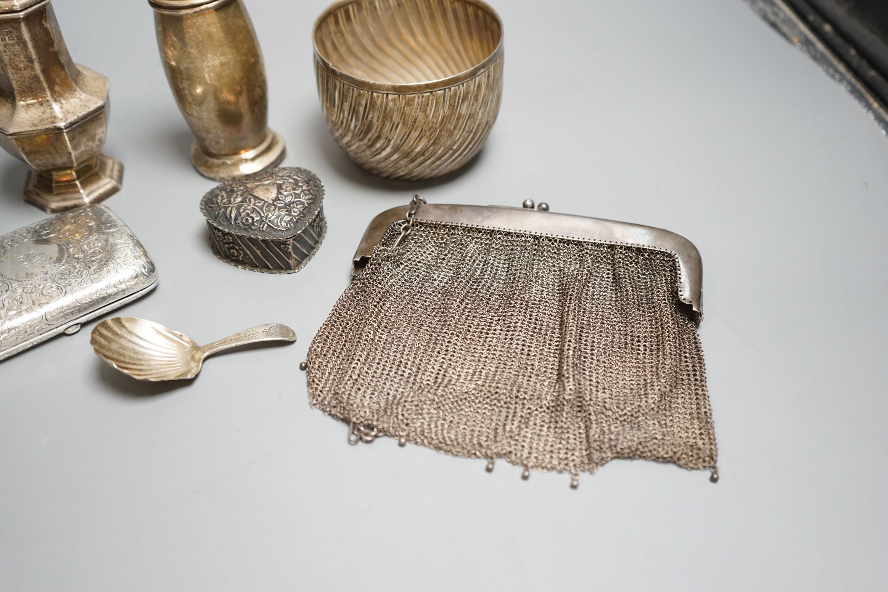 Small silver including a Victorian sugar bowl(split), two sugar casters, a pot pourri box(a.f.), cigarette case, caddy spoon etc.